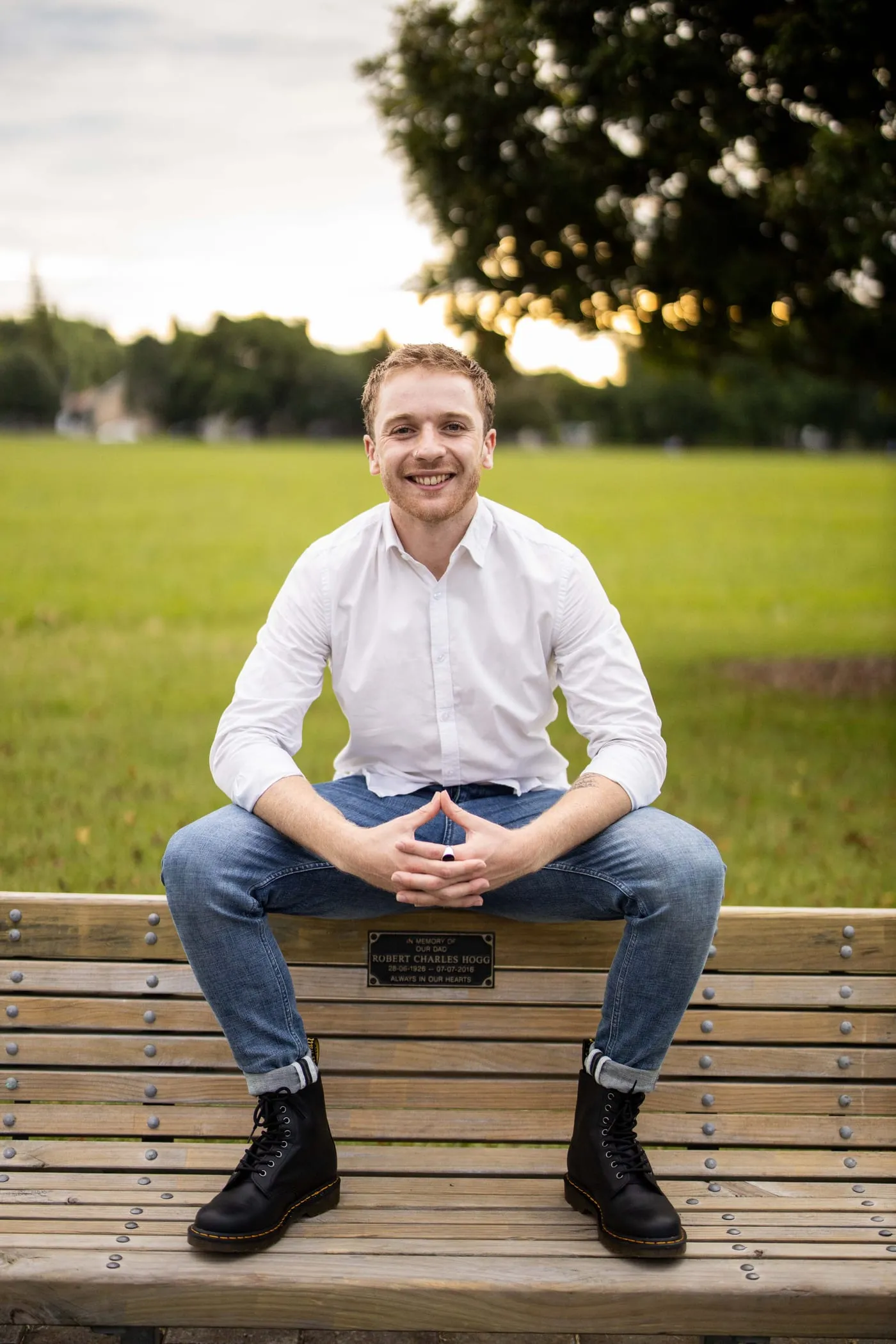 Jordan Schmidt sitting on a park bench